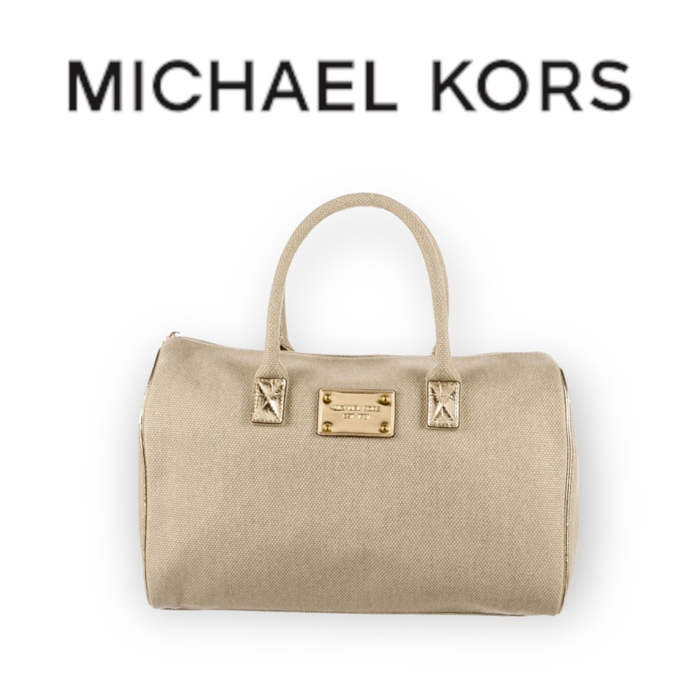 Michael Kors Canvas & Gold Metalic Leather Mini Duffle. 
Brand New Never Used.